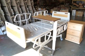 Hospital bed Hill Rom Advance Series with side bed table and over bed table 